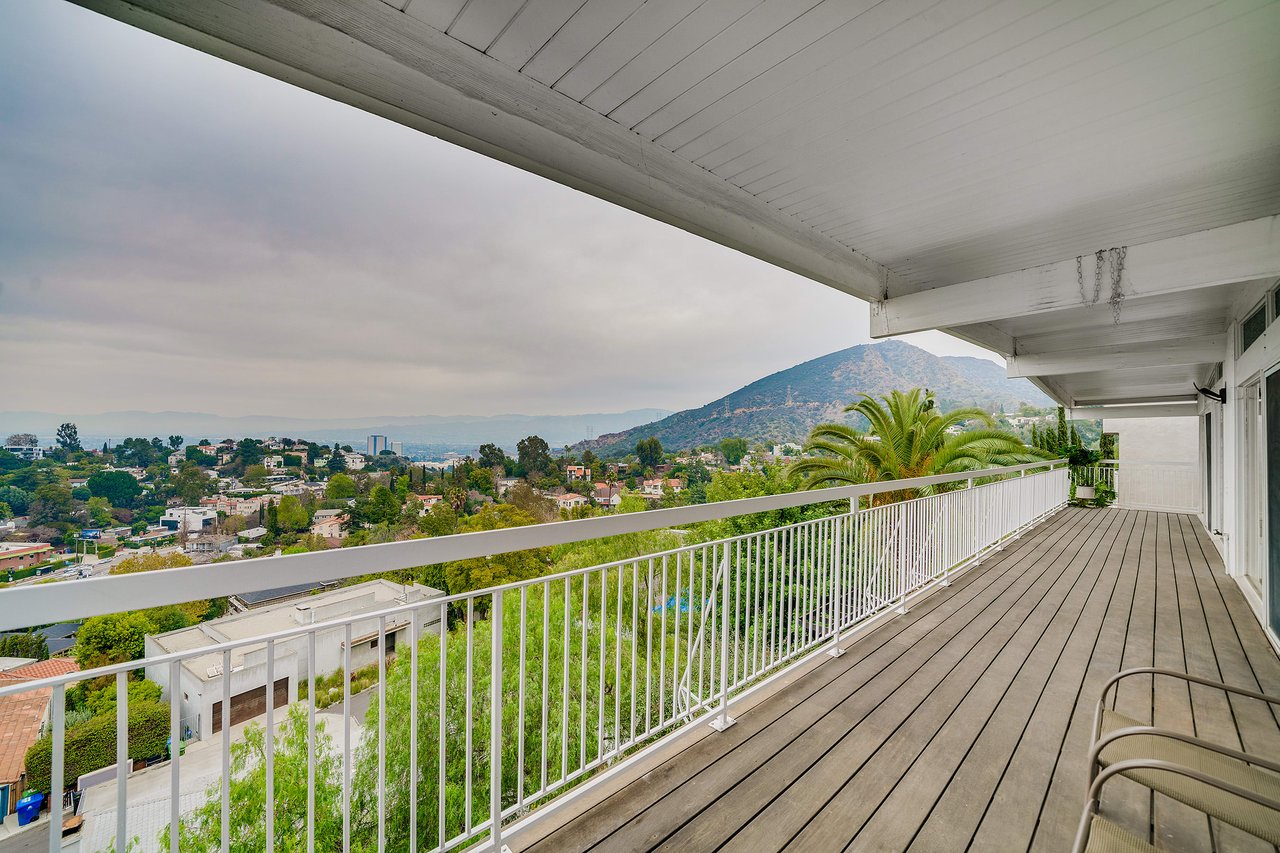 Mid Century with Potential in Lovely Lake Hollywood