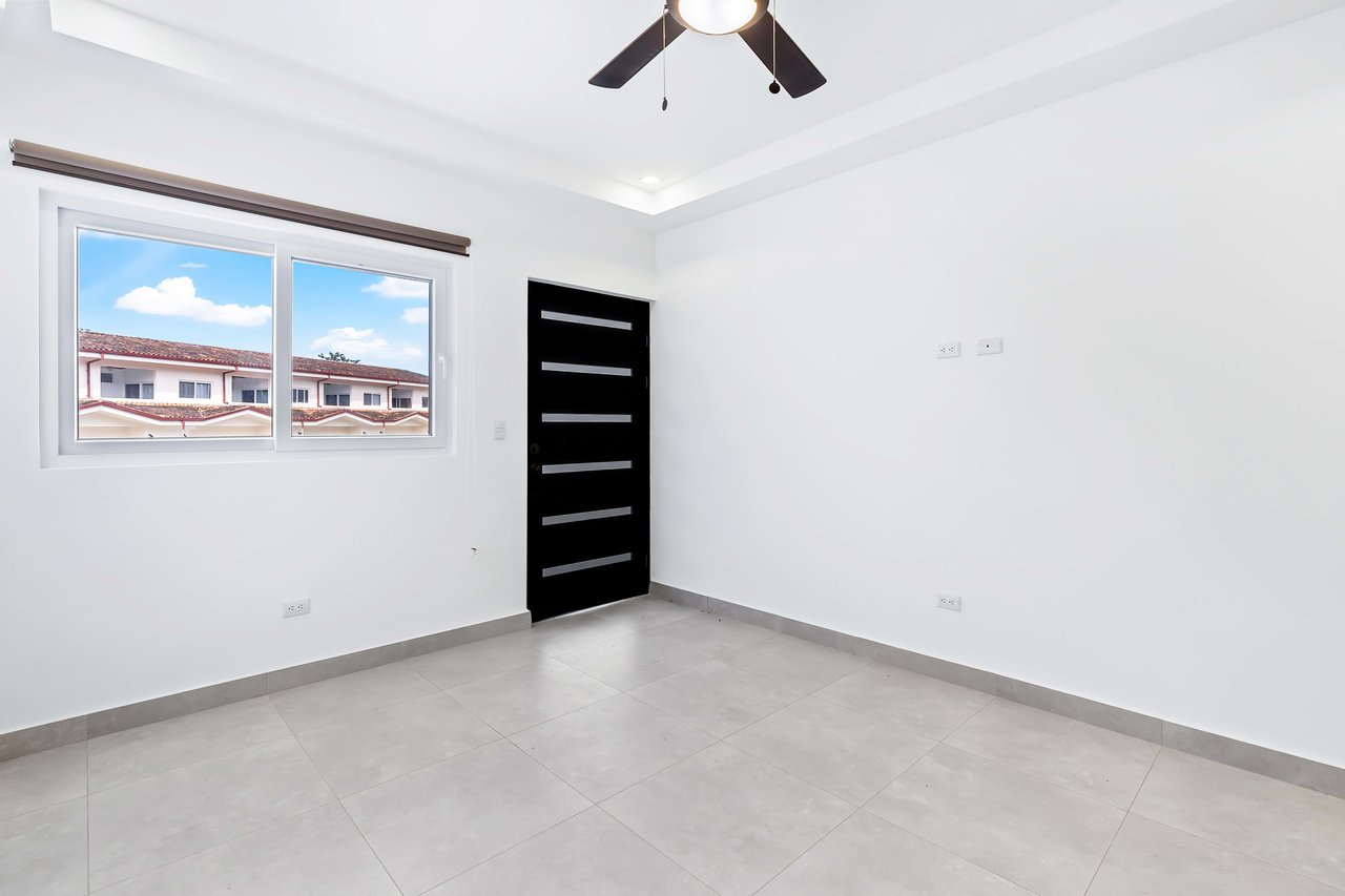 Jacarandas #22 | Modern Townhome with Amenities Just Minutes from the Beach