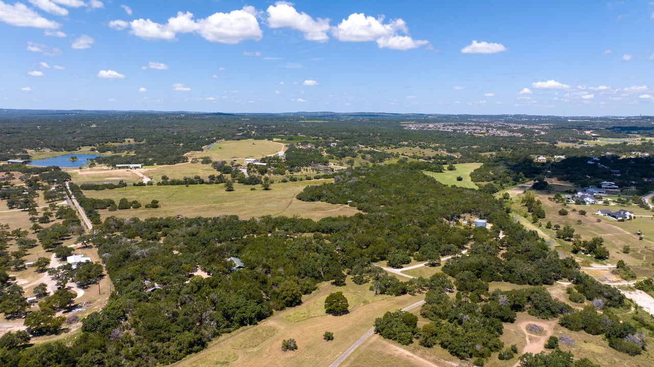 UNRESTRICTED ACREAGE WITH RANCH ROAD 12 FRONTAGE