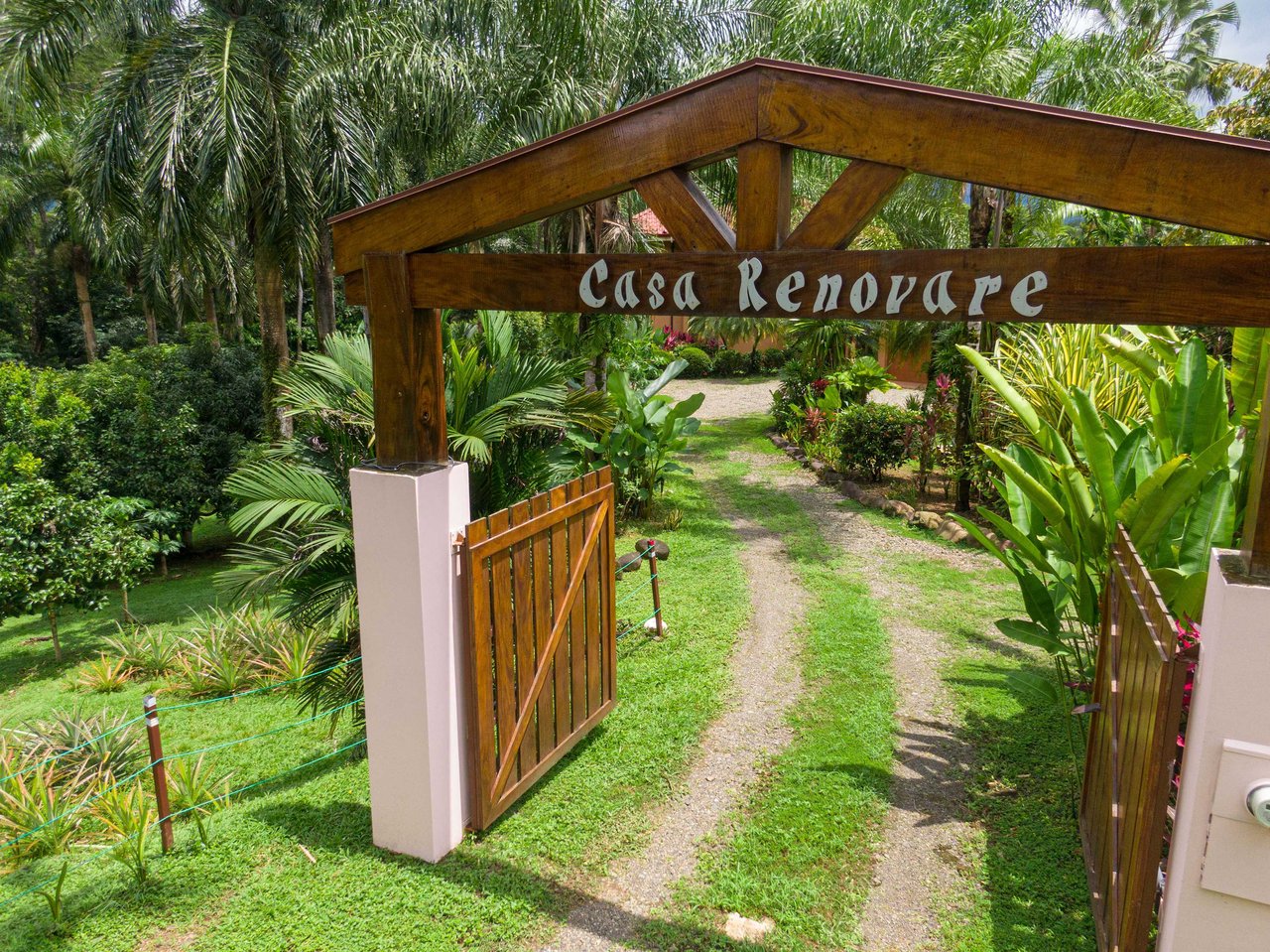 Stunning Tropical Home in Gated community with Hundreds of fruit trees  