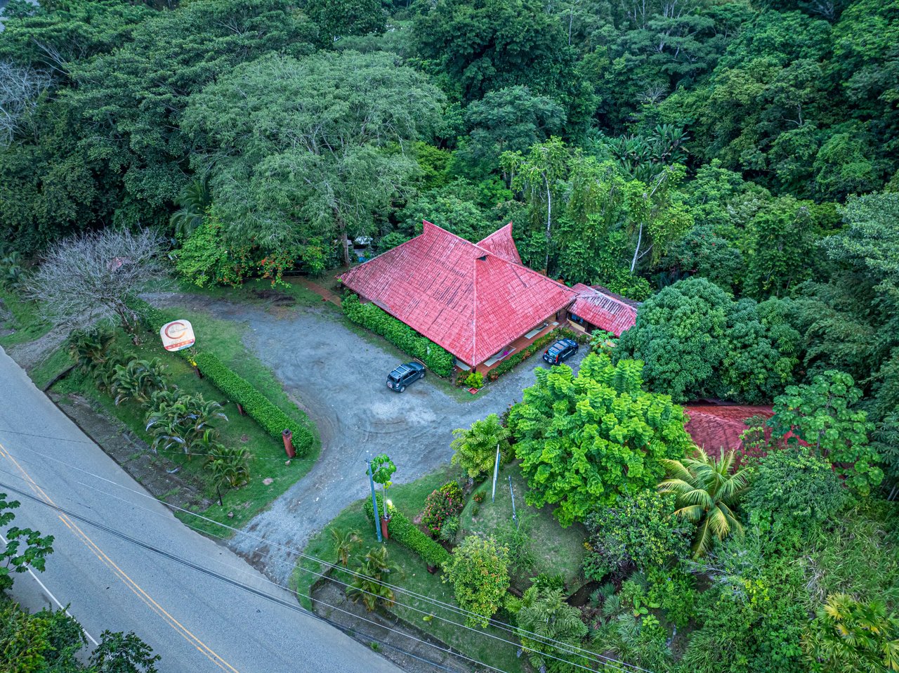 10-Acre Uvita Commercial Property with Existing Hotel & Highway Frontage – Development Potential Near the Beach