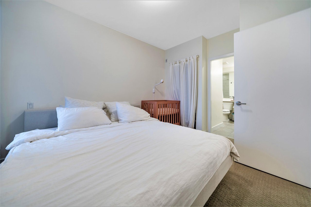 606-7169 14th Ave