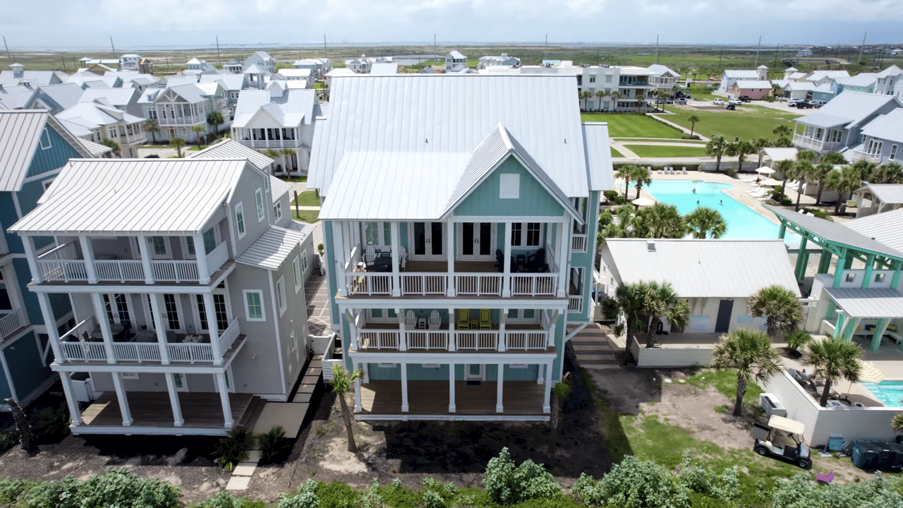 Experience Coastal Luxury: Modern Elegance with Additional Gross Rental Income Potential!