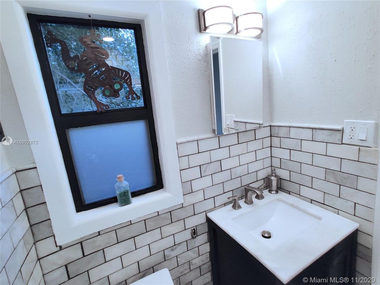 295 NW 39th St