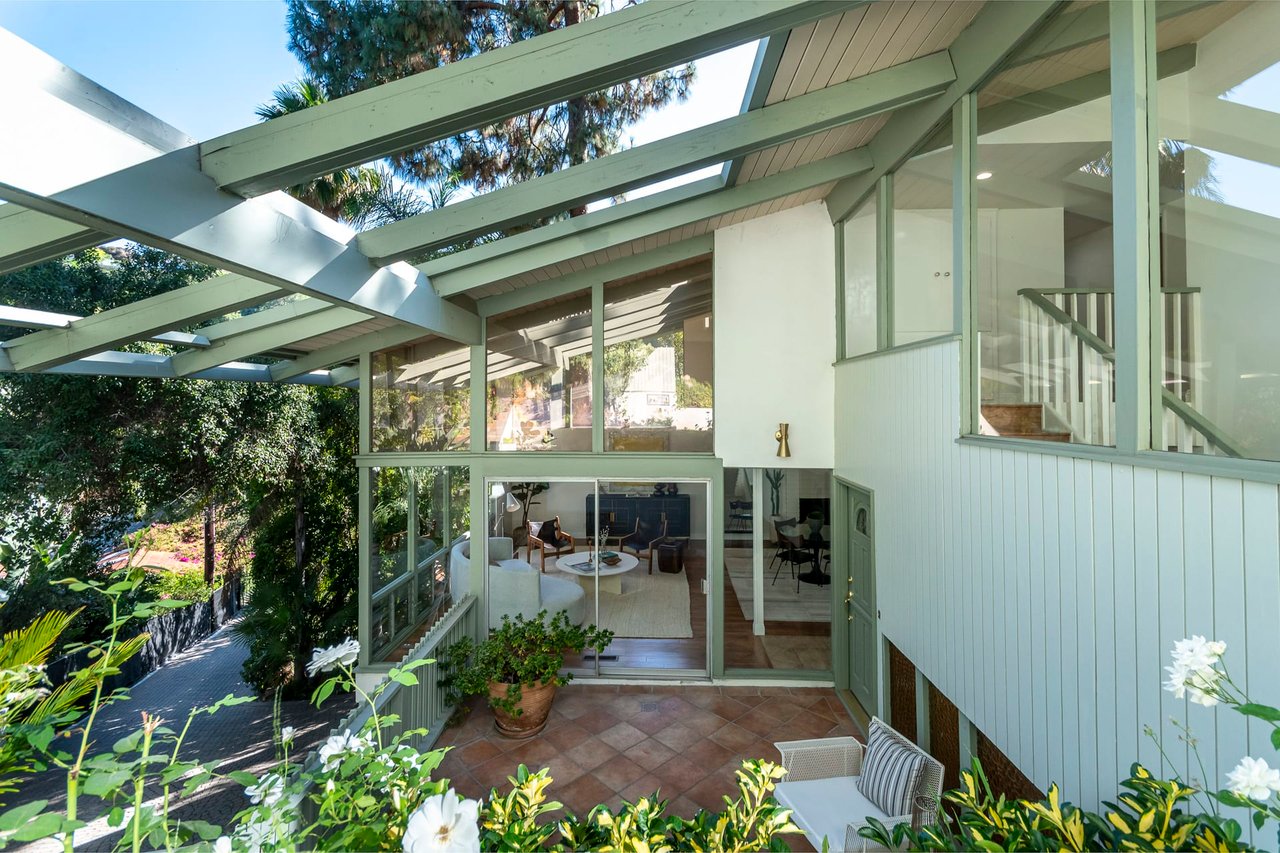 Huge Windows Open This $1.6M L.A. Midcentury to Its Hillside Site