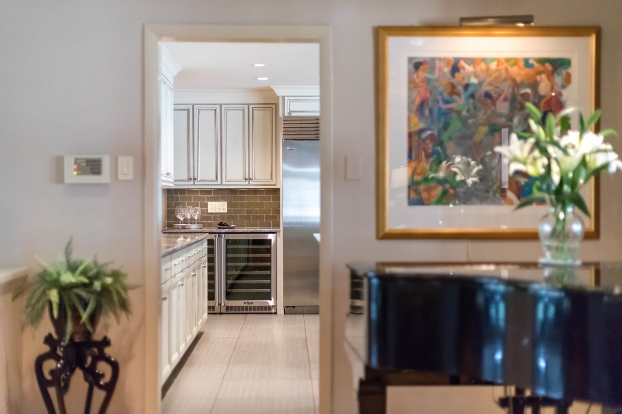 A Special Retreat on a Prized One Acre Lot With Pool and Tennis Court