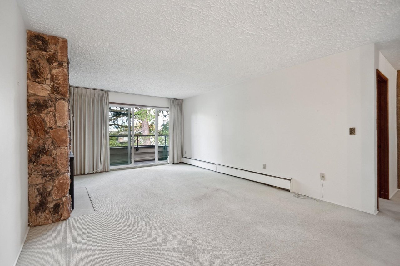 303-1266 W 13th Ave