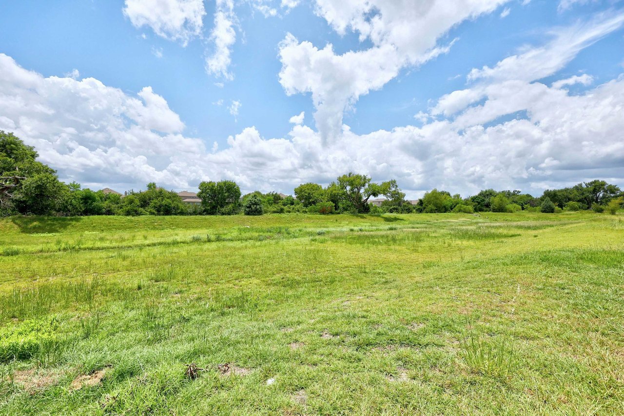 Beautifully Appointed Single-Story in Oak Creek: Modern Floors and Screened-In Patio Overlooking Green Space w/ NO Backyard Neighbor!