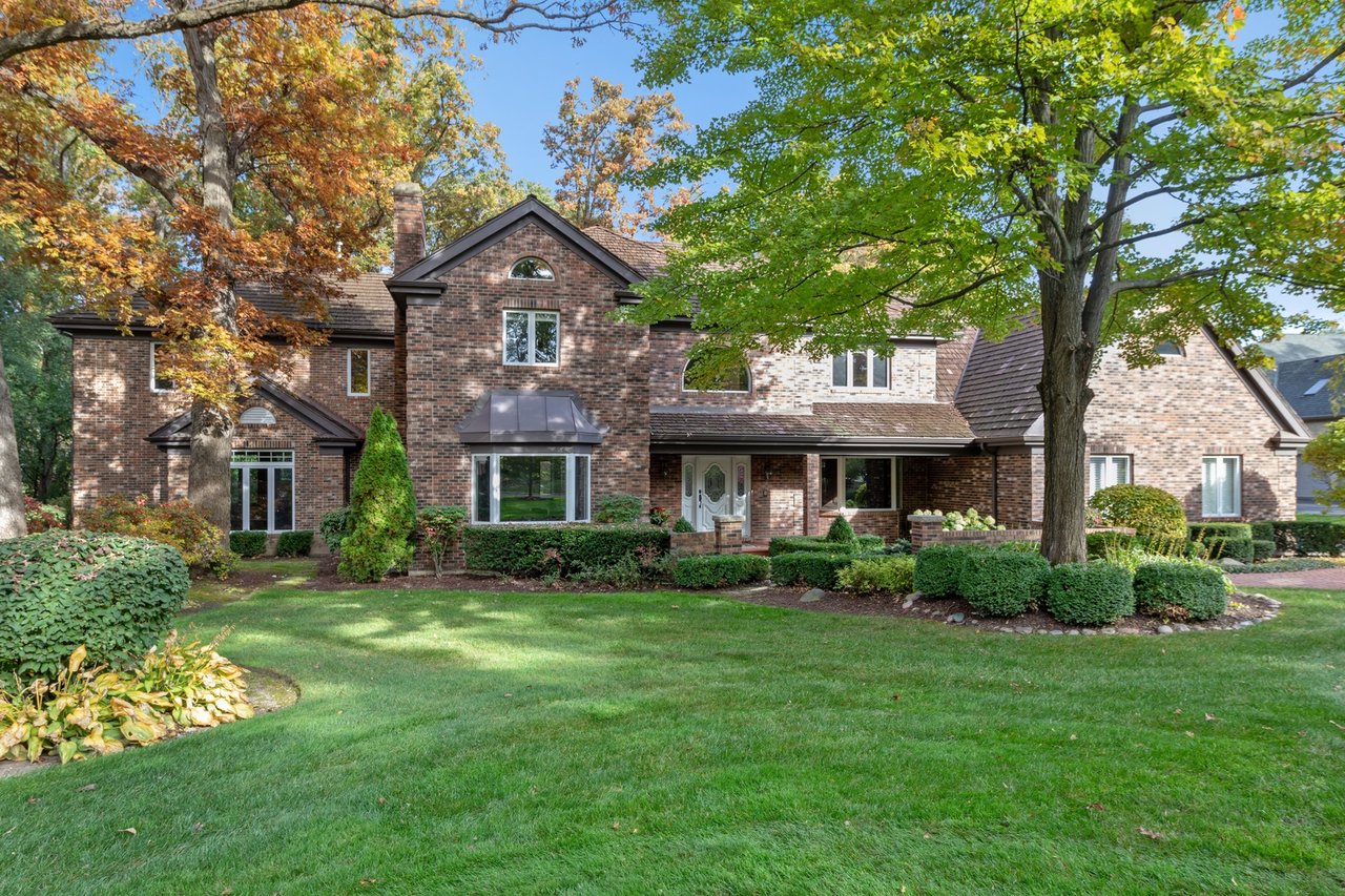 Beautifully Appointed Home in a Gated Community on Over an Acre of Professionally Landscaped Grounds with Pond Views
