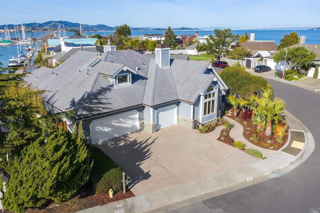 Dramatic Waterfront Home with Private Boat Slip- Represented Buyer