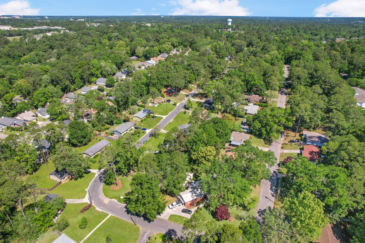 Another aerial view of the Old St. Augustine neighborhood, showing houses, streets, and trees from a different angle.