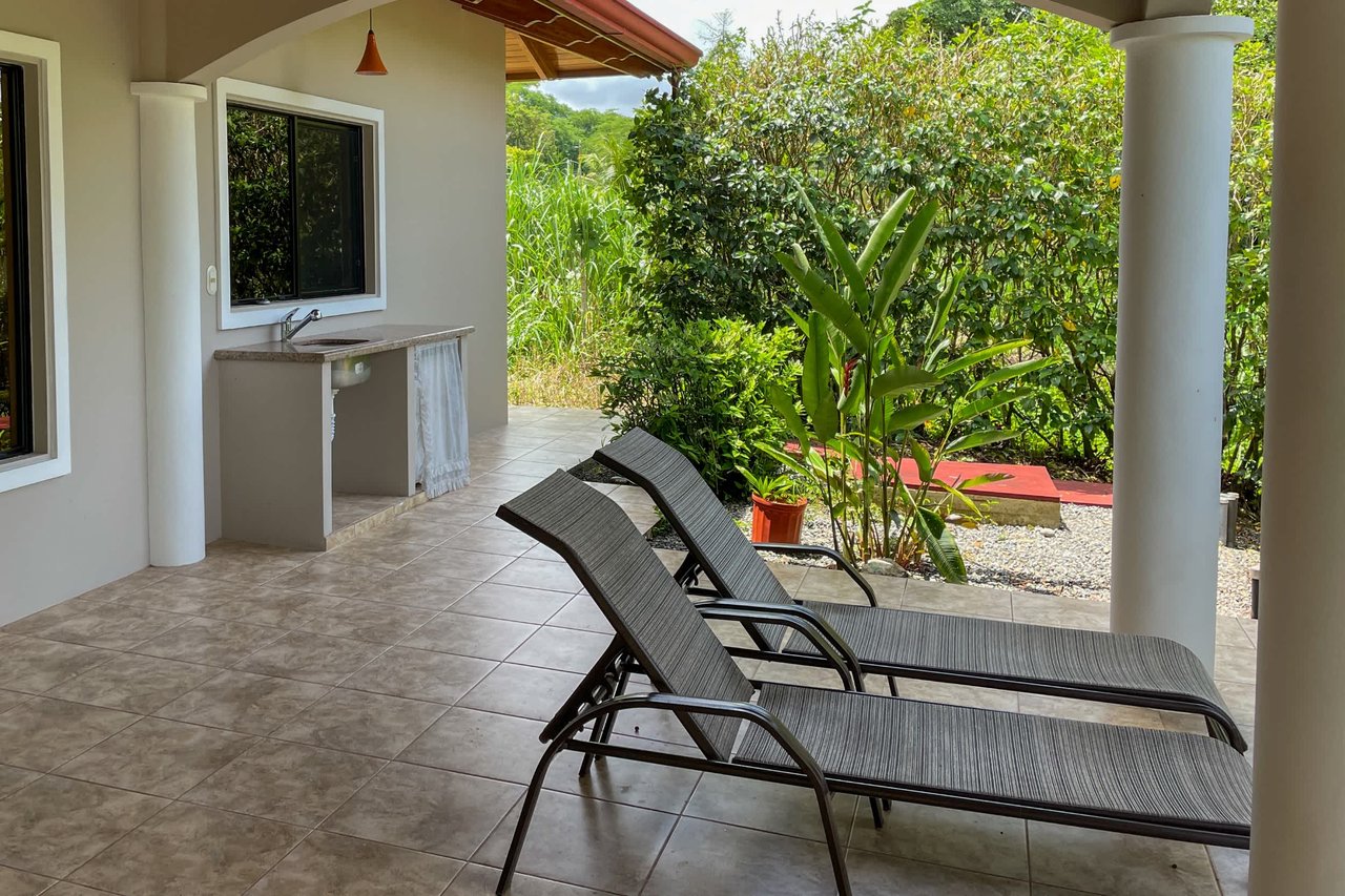 Turnkey Spacious Home with Open Layout, Pool & Small Ocean View in Ojochal Gated Community