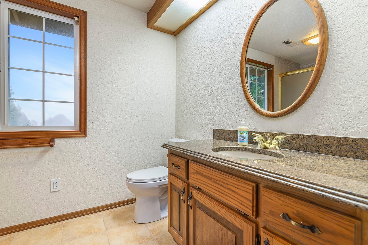 Now, let's explore the second primary bathroom, a well-appointed space that complements the comfort and convenience of the primary bedroom suite.