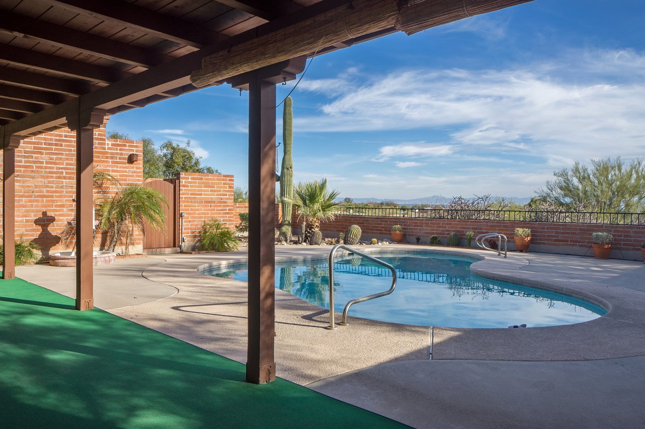 SITUATED IN THE DESIRABLE VISTA DE LAS CANDELAS ESTATES