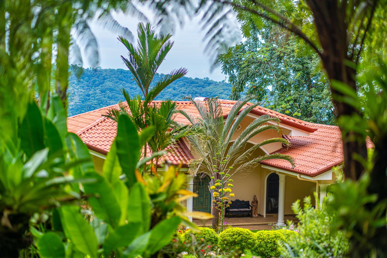 Beautiful 4500 sq ft home on 3.5 acres, gated community, expansive ocean, valley, and jungle views!