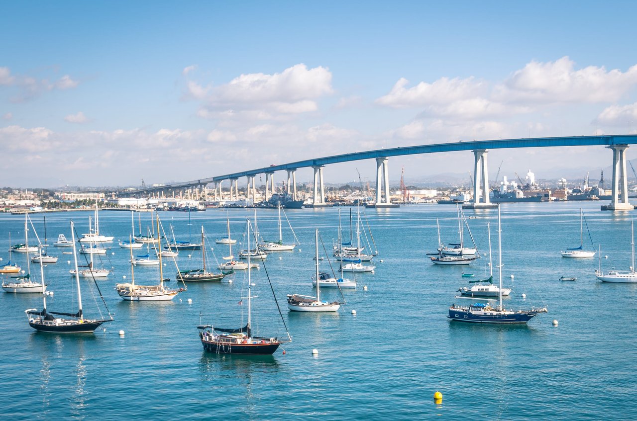 a bunch of boats in a body of water