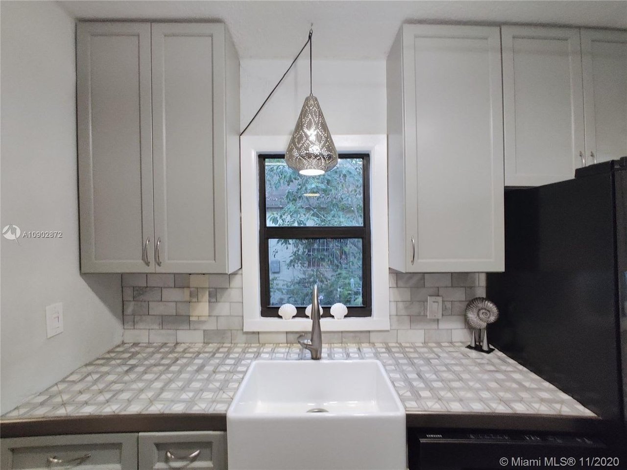 295 NW 39th St