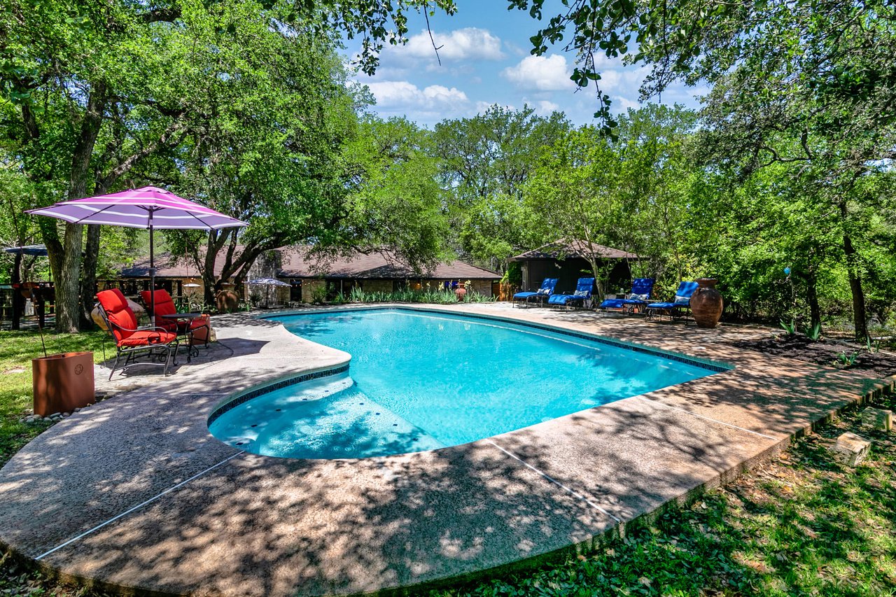 Updated, unrestricted Hillcountry Gem nestled in the Live Oak Trees