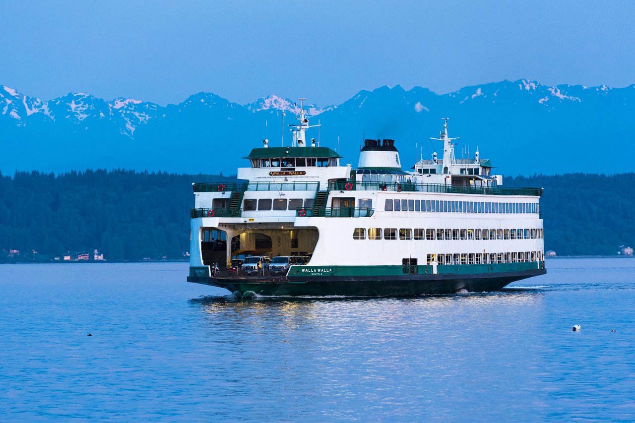 A large ferry named MV Walla Walla floating on a lake.