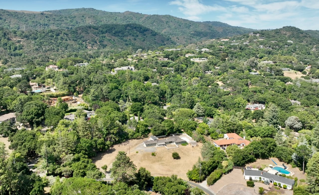 Gated Legacy Estate Lot Site on Secluded Acre- Represented Seller