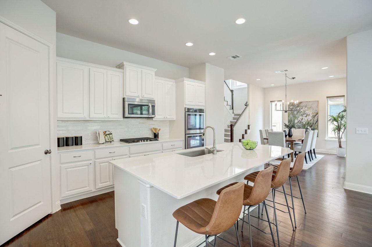 Spacious 4-Bedroom Home in The Preserve at Four Points – A+ School District, Open Floorplan, Luxurious Primary Suite, Covered Patio, and More!