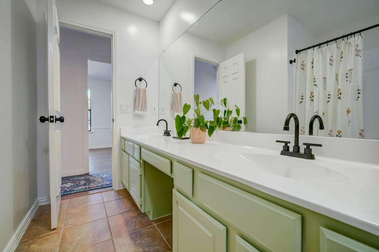 Charming Milwood Home: Updated Single-Story Gem with In-Law Plan & New Roof!