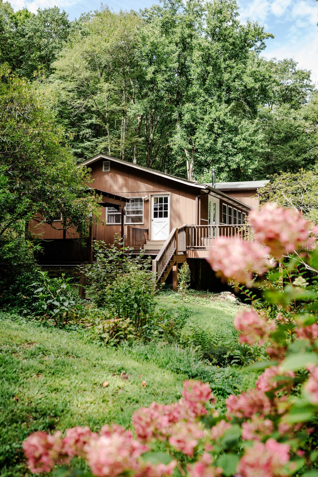 Mountain home with hibiscus flowering in the spring