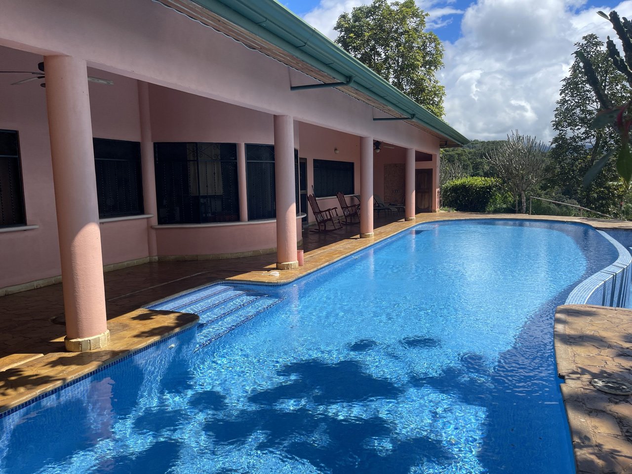 5.2 ACRES – 2 Bedroom Home With 60 Ft Infinity Lap Pool, 1 Bedroom Guest House, Fabulous Ocean View, Mature Fruit Trees!