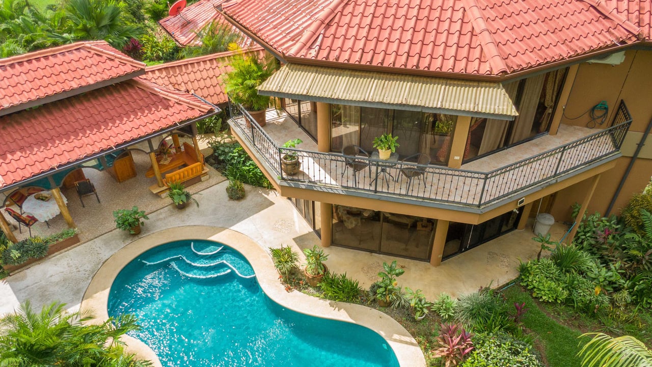 Stunning Tropical Home in Gated community with Hundreds of fruit trees  