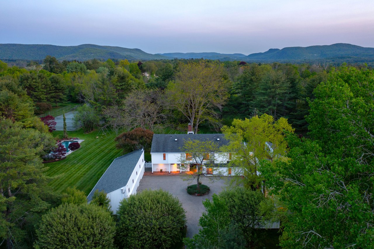Two homes of Stockbridge philanthropists on the same street are now for sale - and a world apart