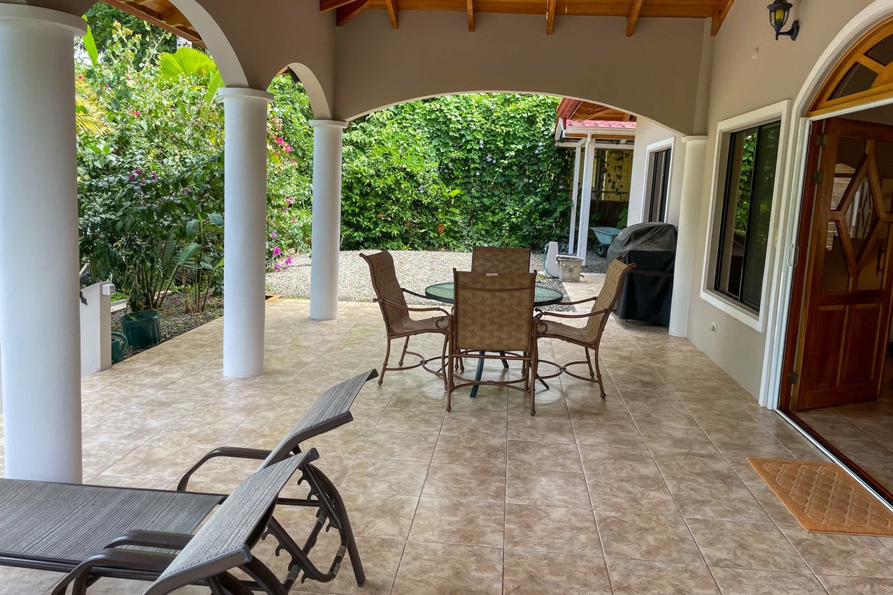 Turnkey Spacious Home with Open Layout, Pool & Small Ocean View in Ojochal Gated Community