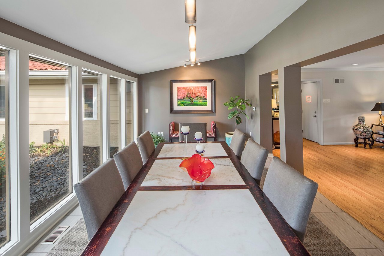 A Special Retreat on a Prized One Acre Lot With Pool and Tennis Court