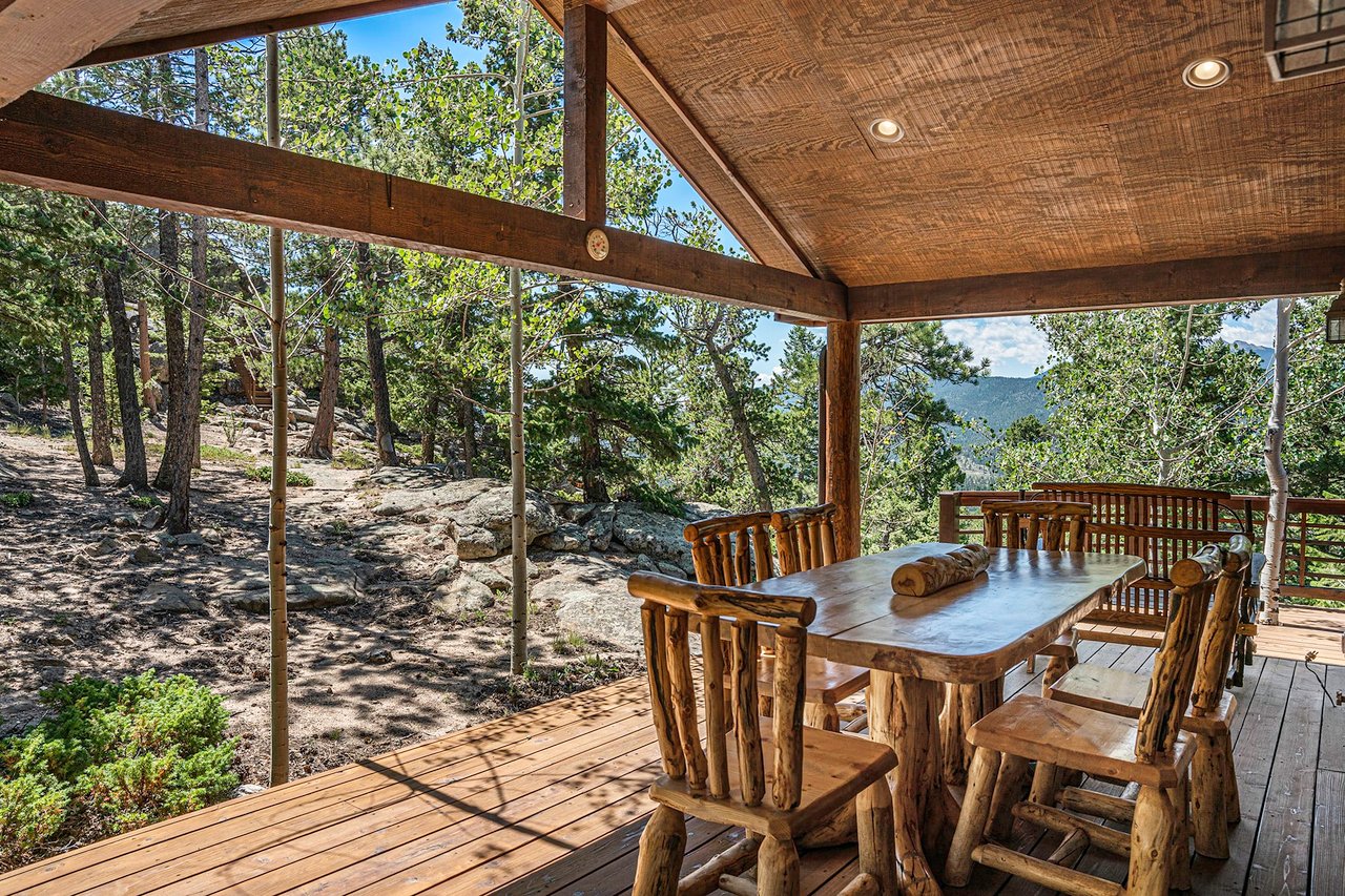 Log table on deck in Rocky Mountains