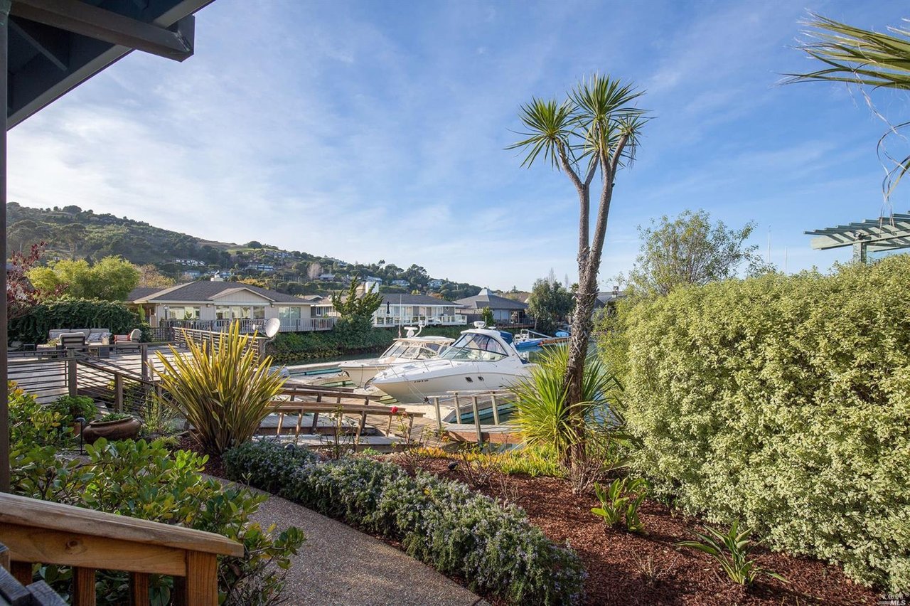 Dramatic Waterfront Home with Private Boat Slip- Represented Buyer