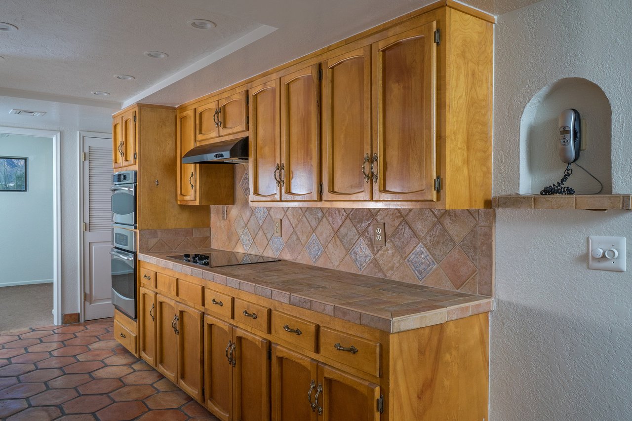 SITUATED IN THE DESIRABLE VISTA DE LAS CANDELAS ESTATES