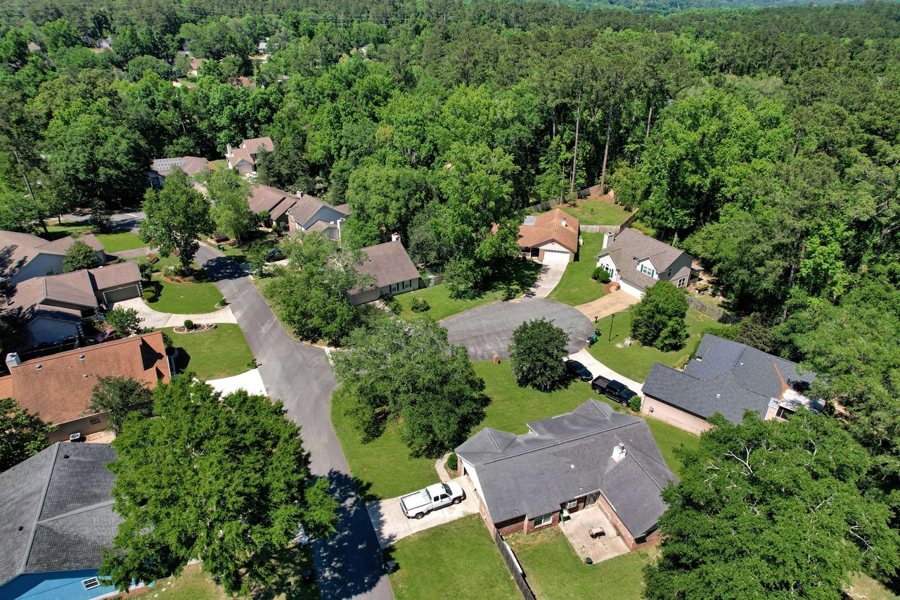 An aerial view of Centerville Trace, highlighting the layout of houses and tree-covered areas.