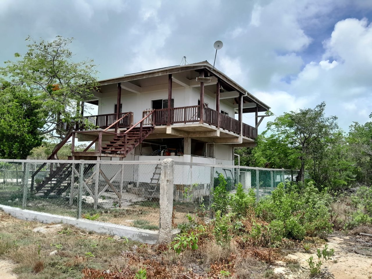 Tropical off-beach, off-grid 2-story home less than half mile to the famous Secret Beach.