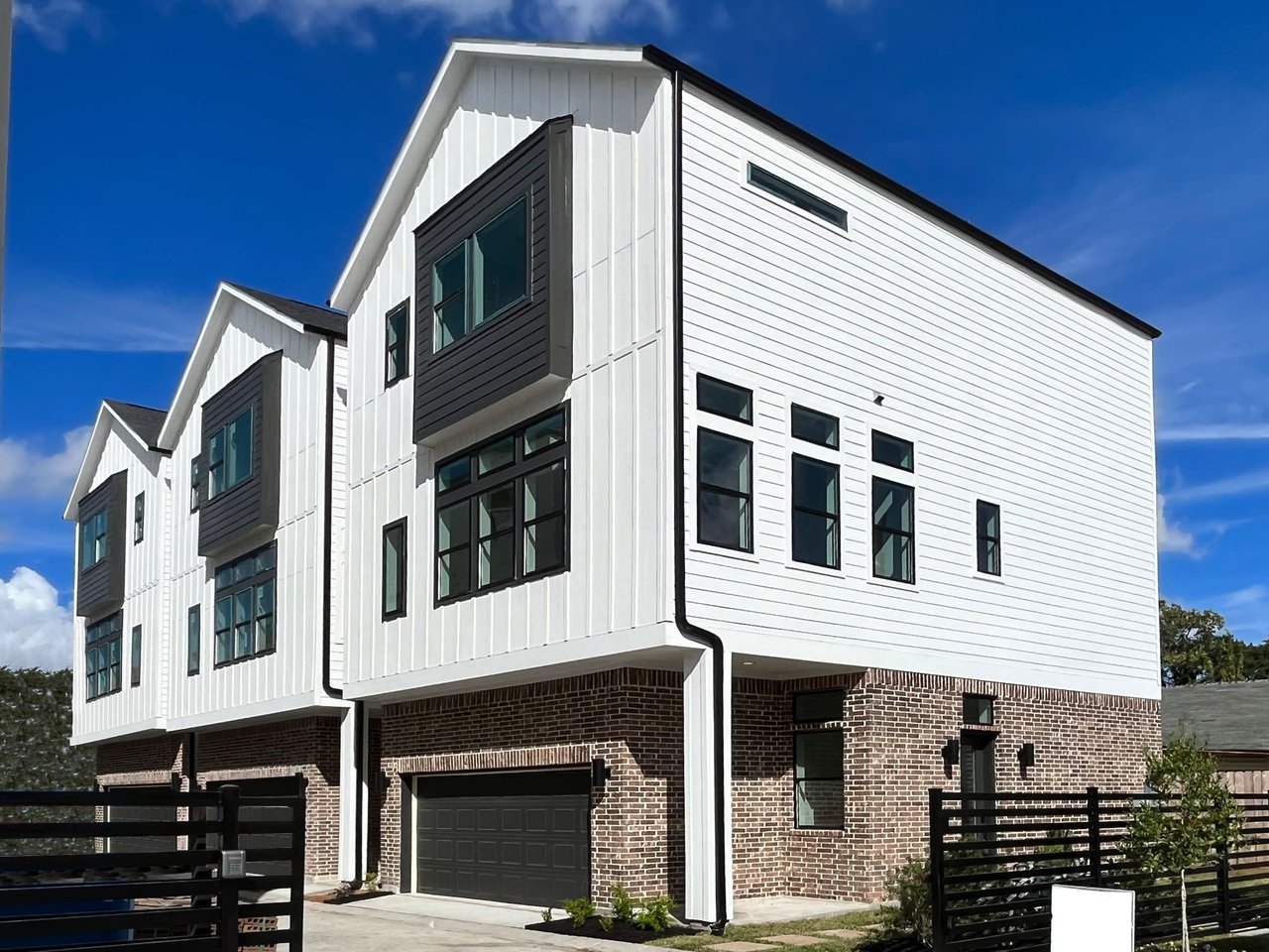 exterior view of 3 newly built townhomes