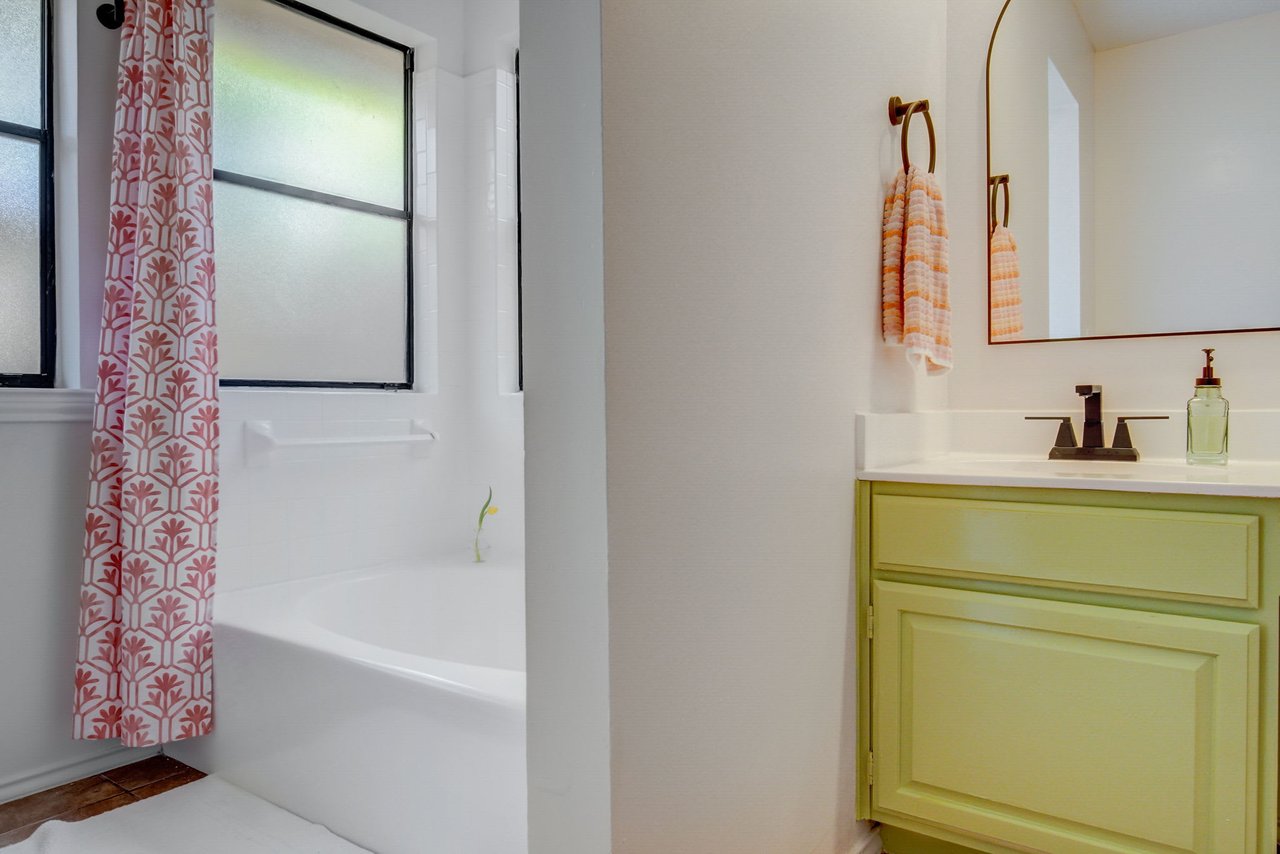 Charming Milwood Home: Updated Single-Story Gem with In-Law Plan & New Roof!