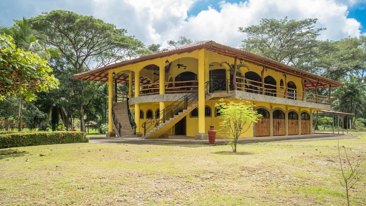 Stunning Tropical Home in Gated community with Hundreds of fruit trees  