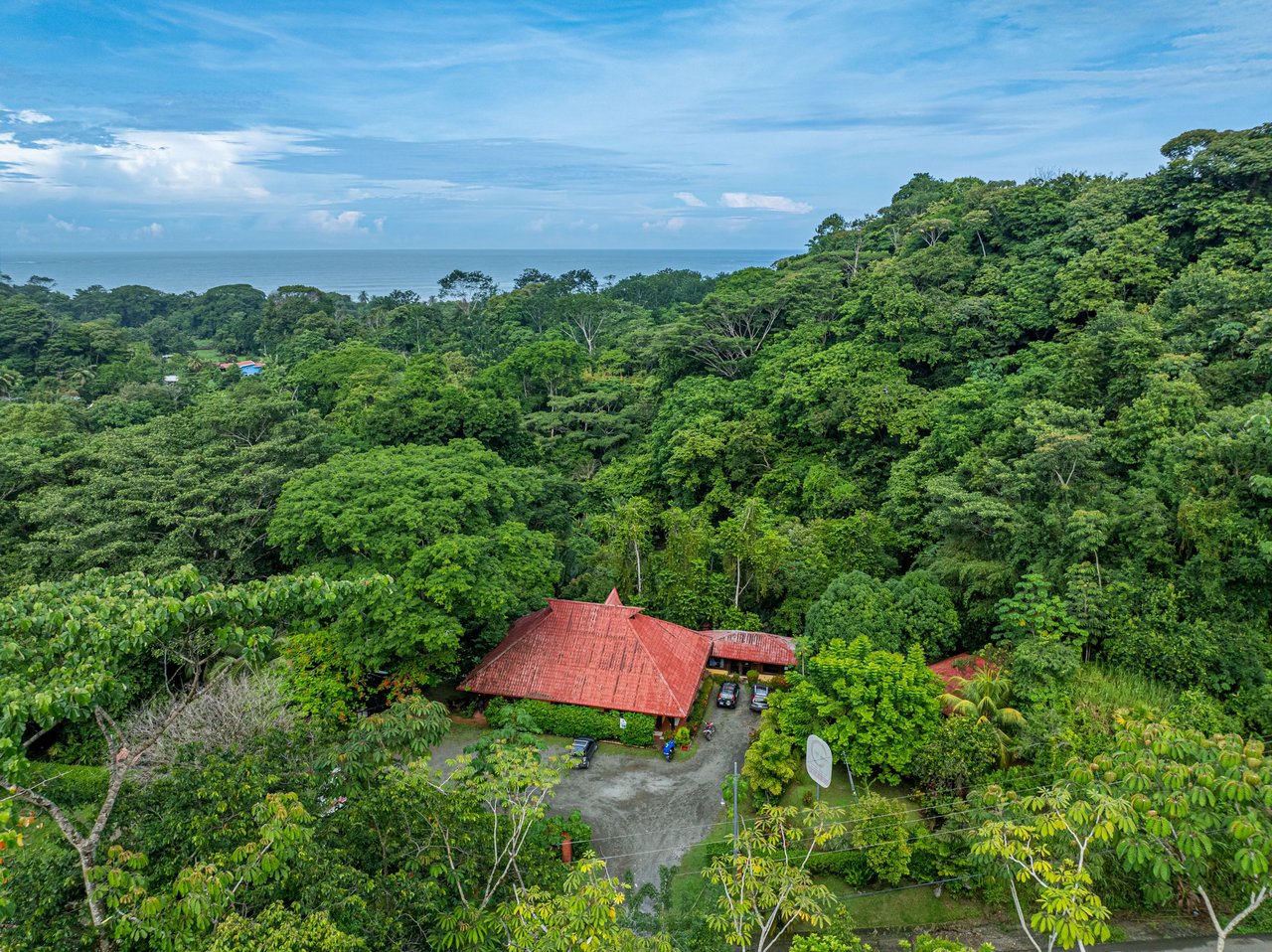 10-Acre Uvita Commercial Property with Existing Hotel & Highway Frontage – Development Potential Near the Beach