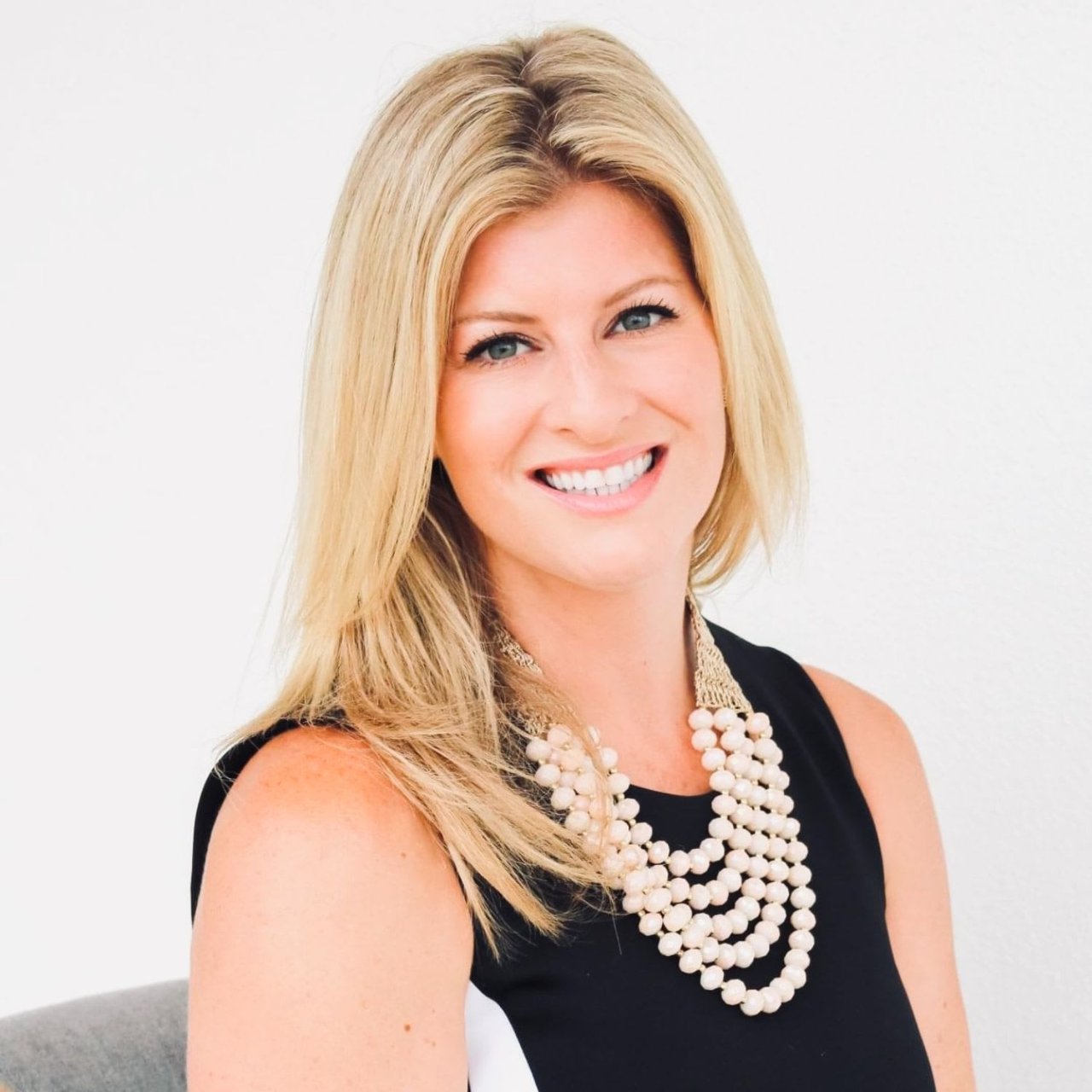 a profile photo of realtor Camille Carney