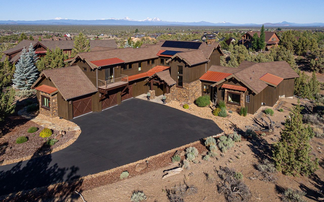 a neutral colored wooden designed home in the desert community