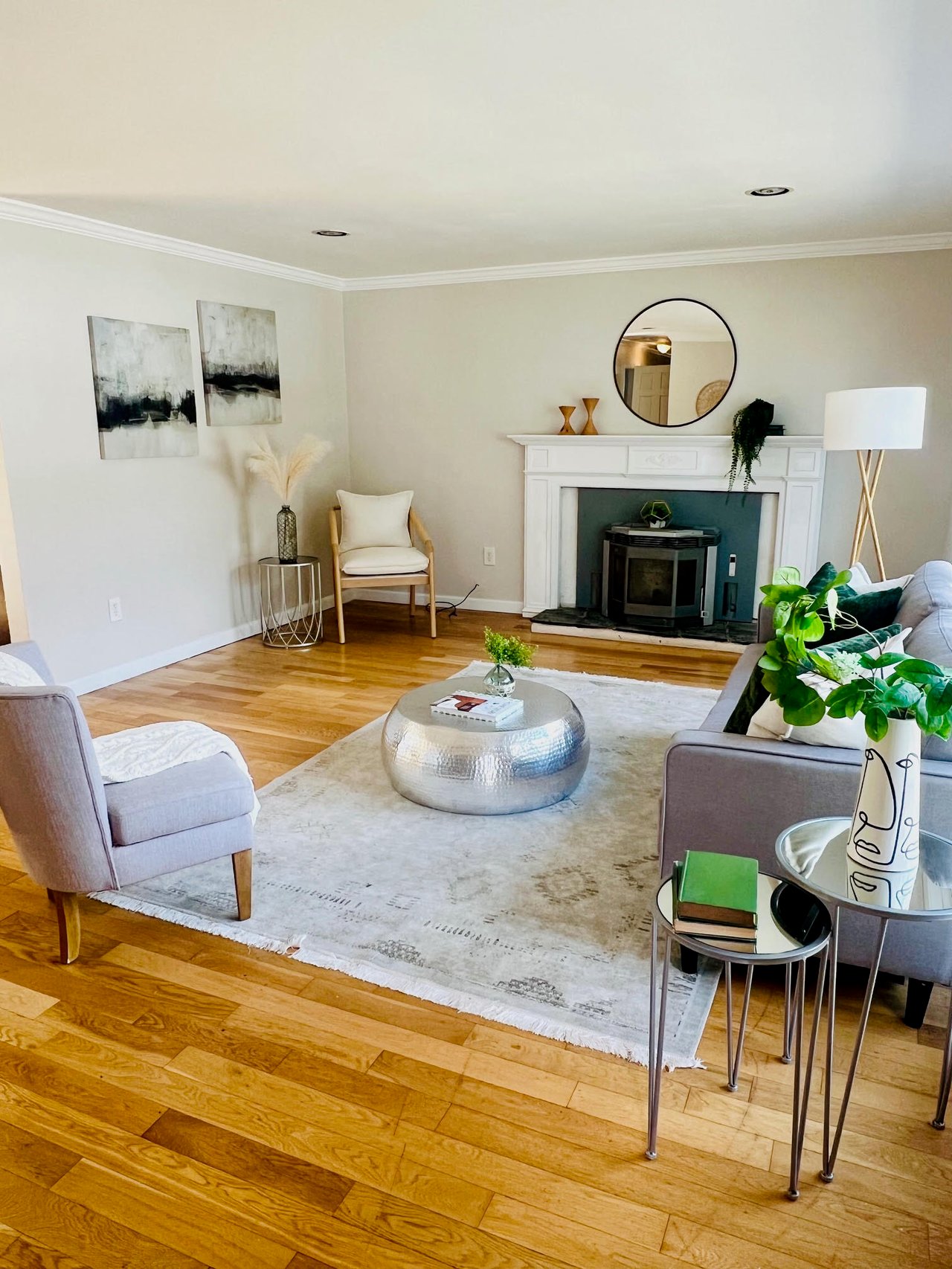 Beautifully staged living room with elegant furniture, stylish decor, and ample natural light for a cozy ambiance.