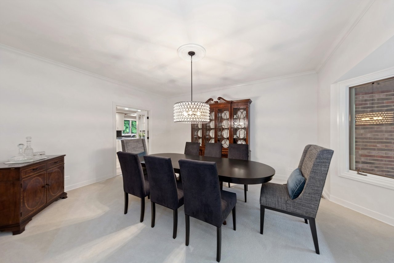 Beautifully Appointed Home in a Gated Community on Over an Acre of Professionally Landscaped Grounds with Pond Views