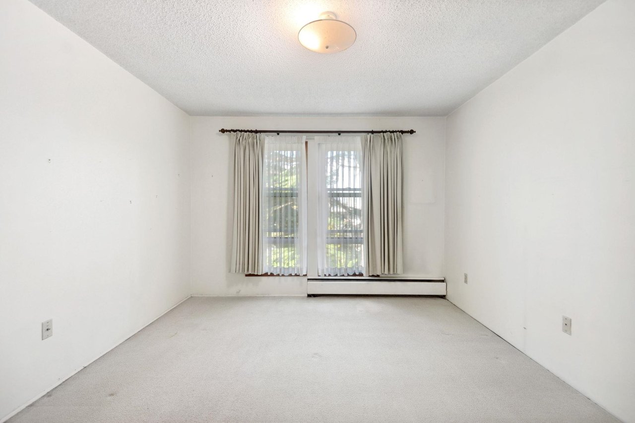 303-1266 W 13th Ave
