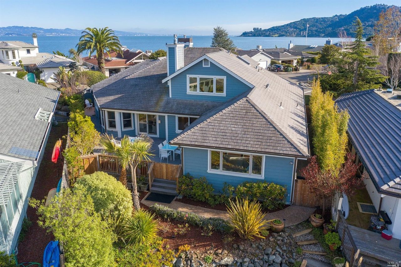Dramatic Waterfront Home with Private Boat Slip- Represented Buyer
