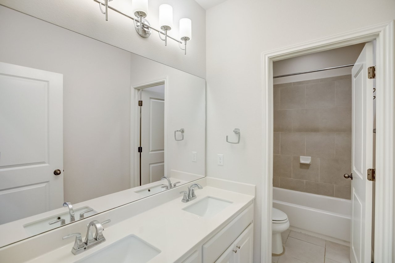 Spacious 4-Bedroom Home in The Preserve at Four Points – A+ School District, Open Floorplan, Luxurious Primary Suite, Covered Patio, and More!