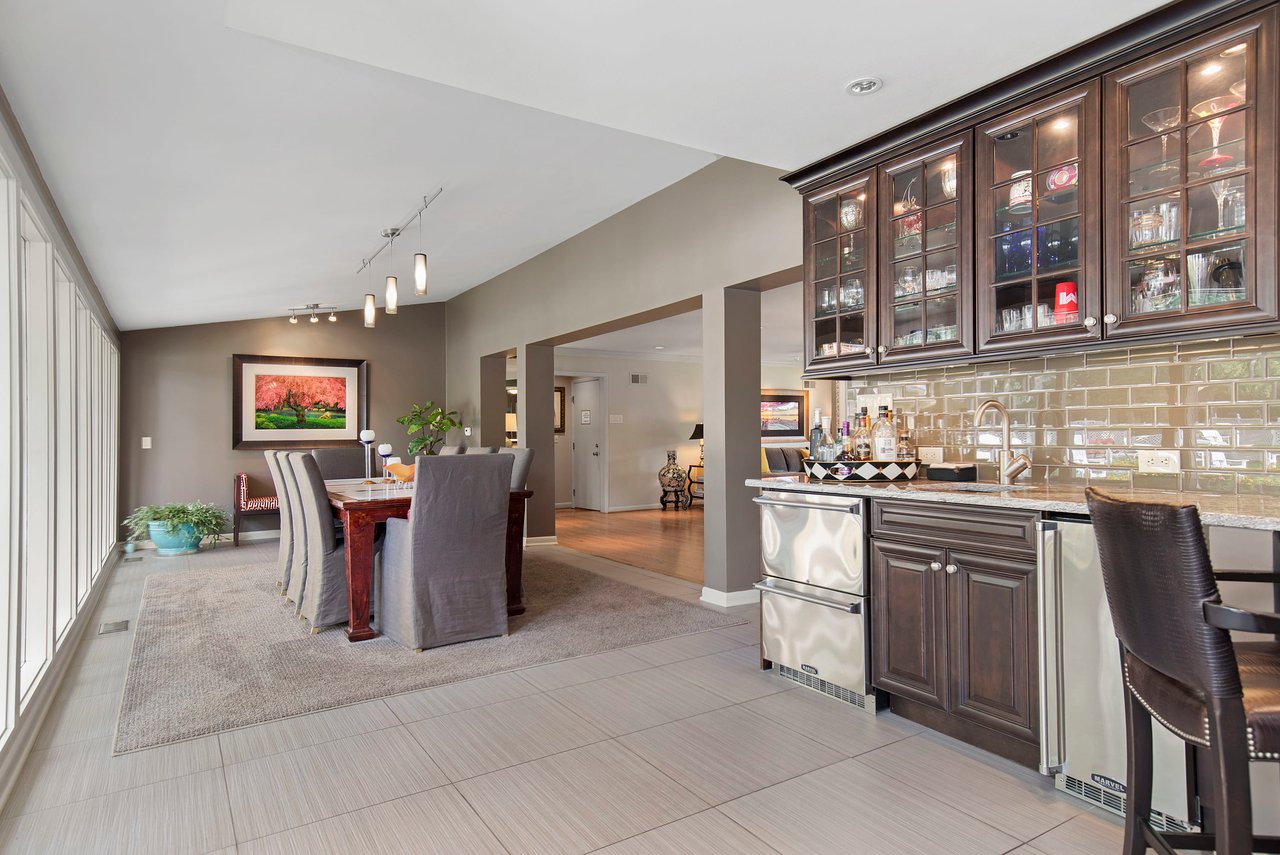 A Special Retreat on a Prized One Acre Lot With Pool and Tennis Court