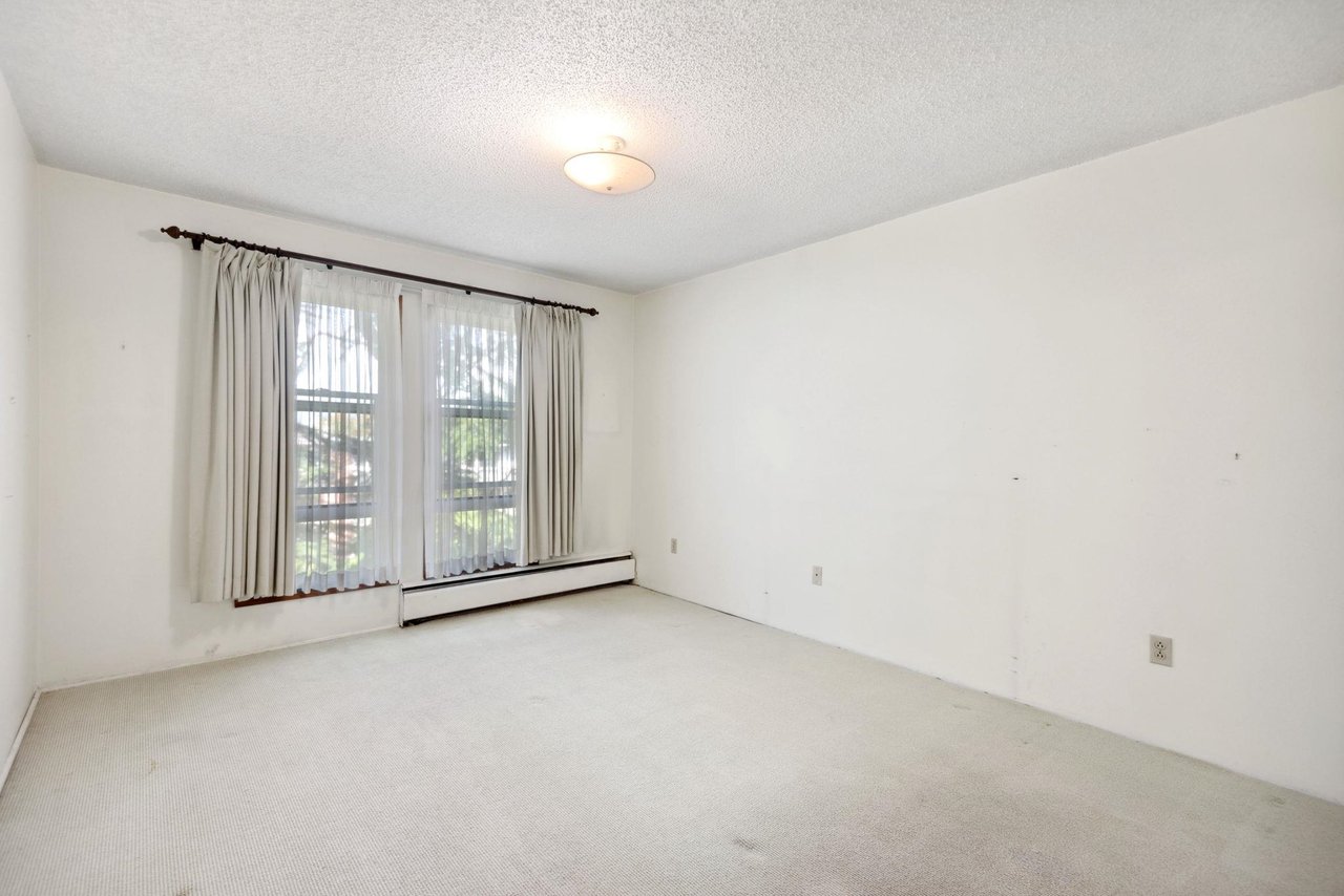 303-1266 W 13th Ave